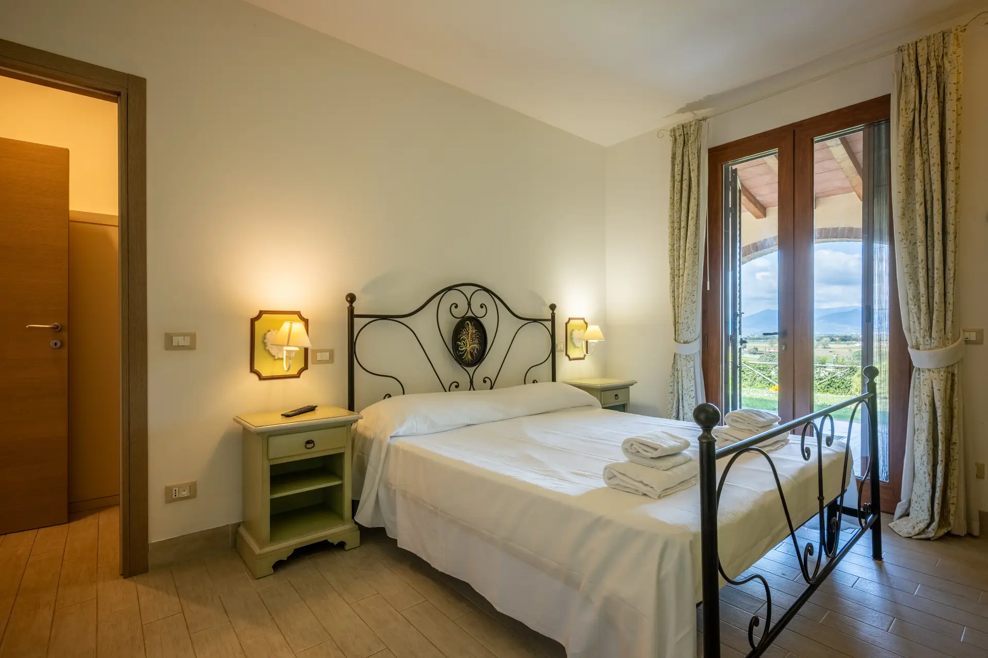 Camera da letto con vista - Appartamento "Leccino"