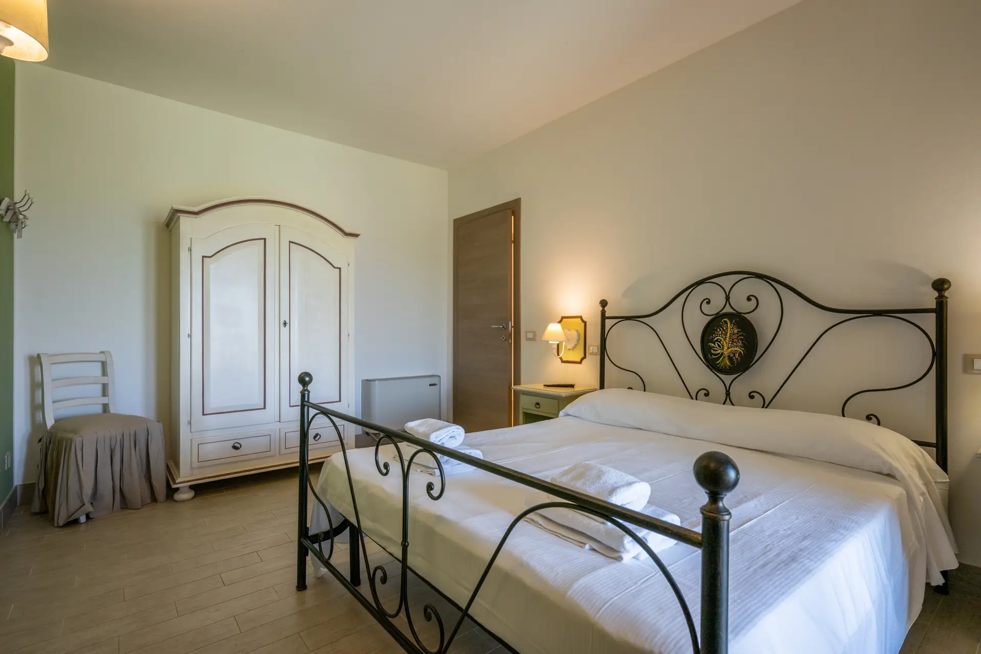 Camera da letto con vista - Appartamento "Leccino"