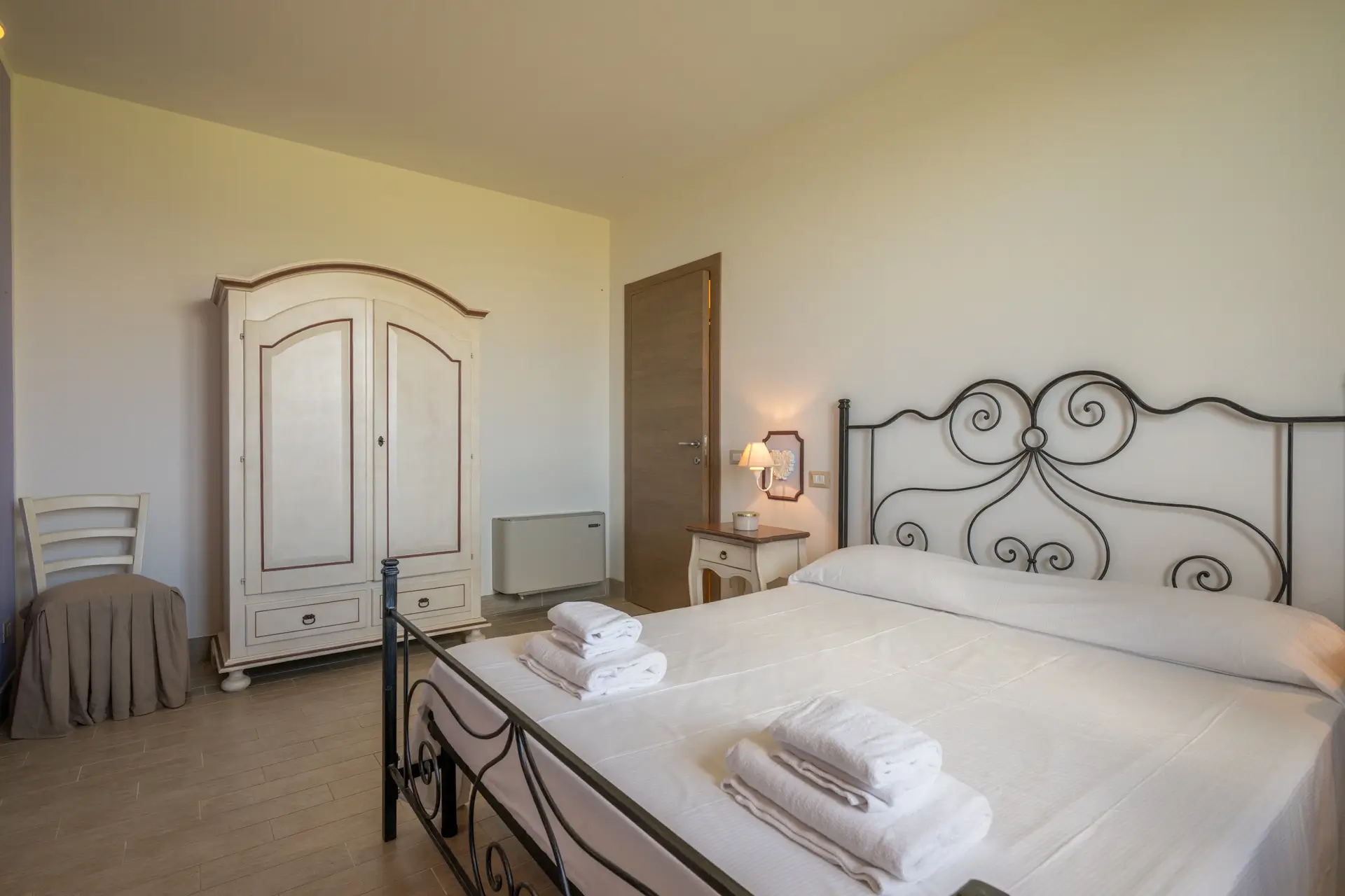 Camera da letto con vista - Appartamento "Moraiolo"